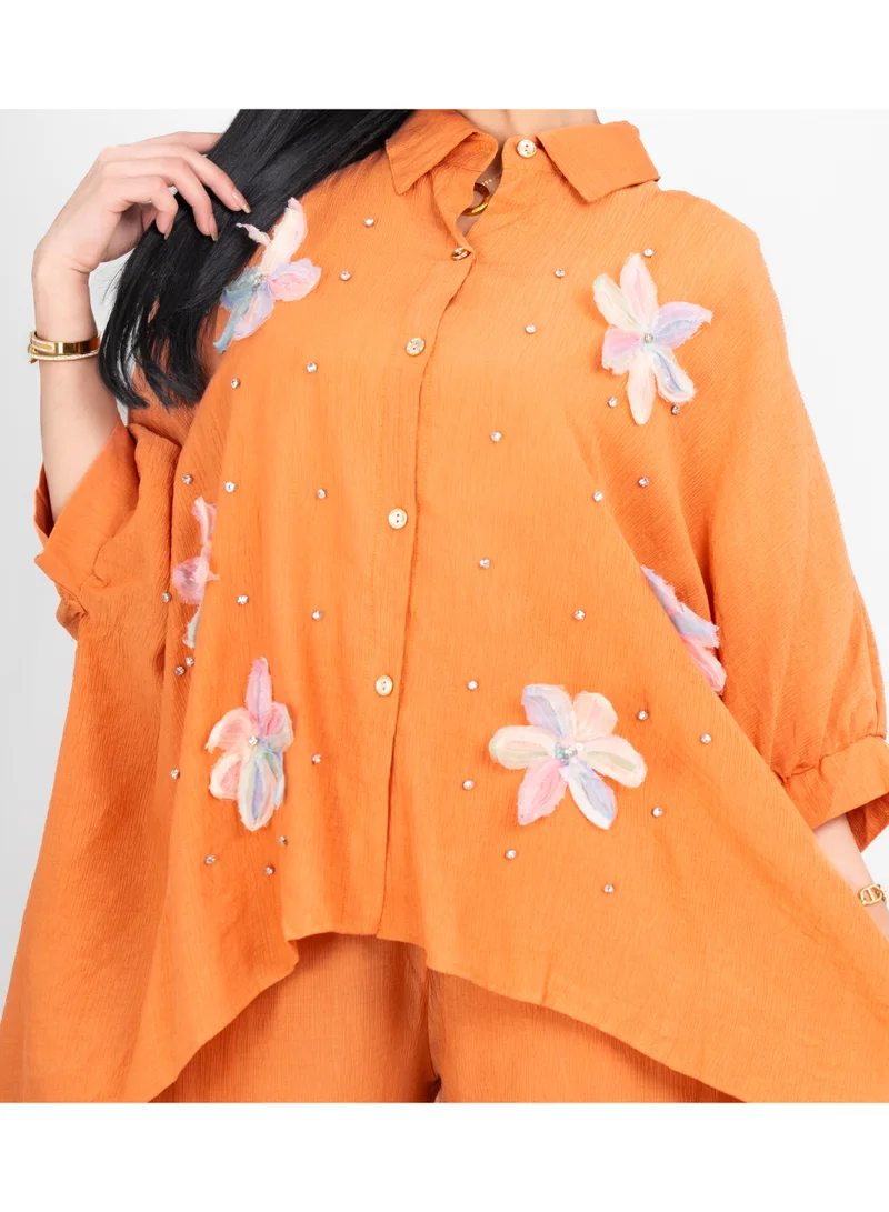 اكسا طقم عصري من قطعتين، قميص وبنطال واسعان بتفاصيل مطرزة بالكريستال